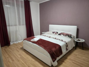 Belvedere apartamento con 3 affitta camere con bagno condiviso